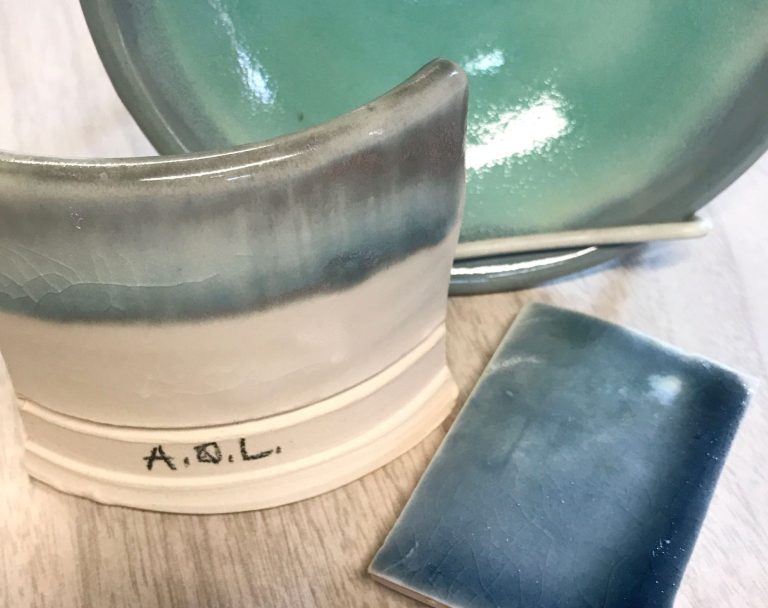 image of three different test tiles in ocean blue, watercolor blue-grey, and celadon with blue-grey glazes.